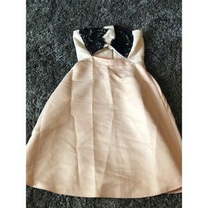 Brand new semi formal dress with cutout